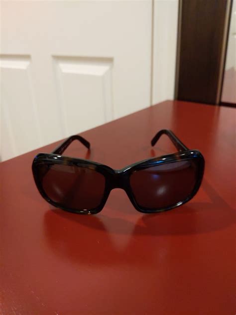 prada sunglasses with case|Prada sunglasses tortoiseshell.